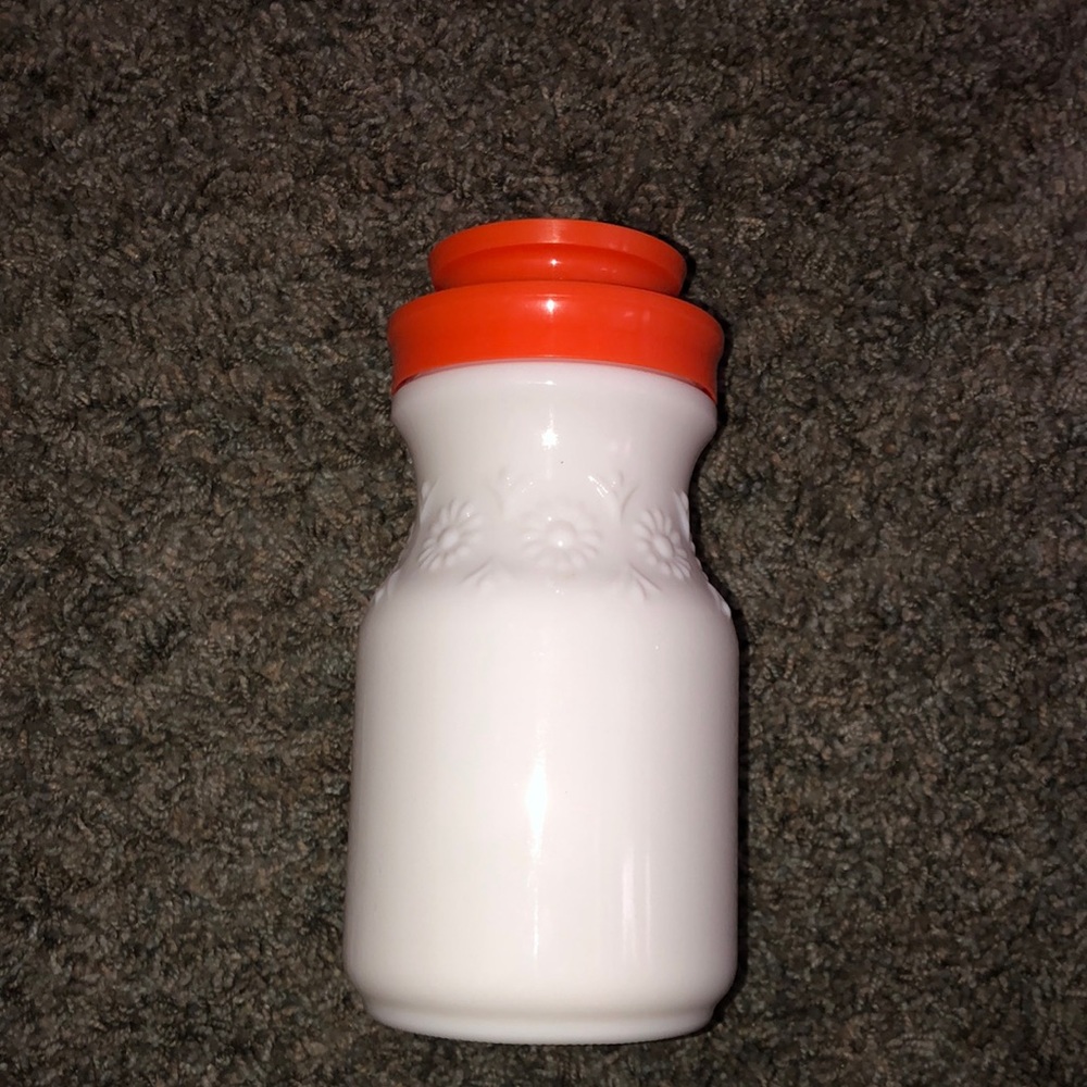 Vintage milkglass tang jar with original lid.